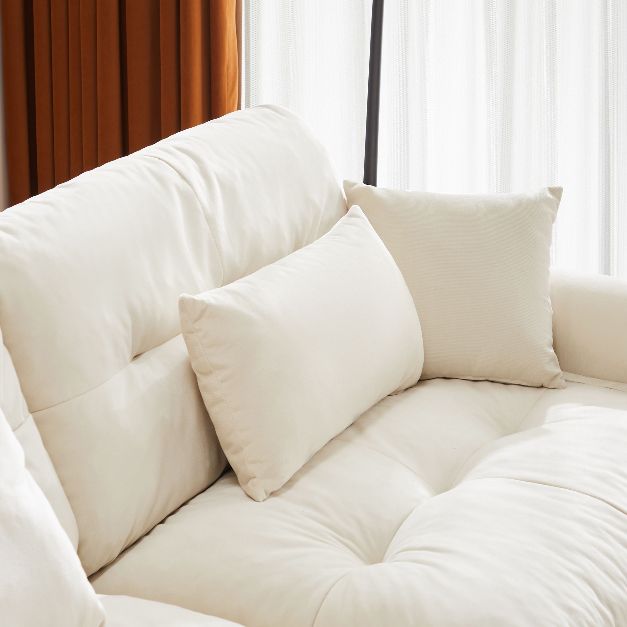 Modern Sofa With Bolstered Armrests And Pillows