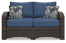 Windglow Outdoor Loveseat and 2 Chairs with Coffee Table