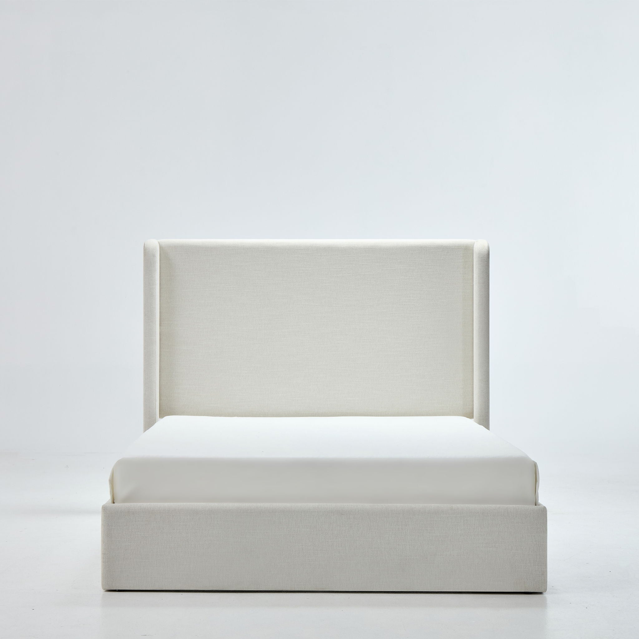 Caron - Upholstered Wingback Bed With High Headboard