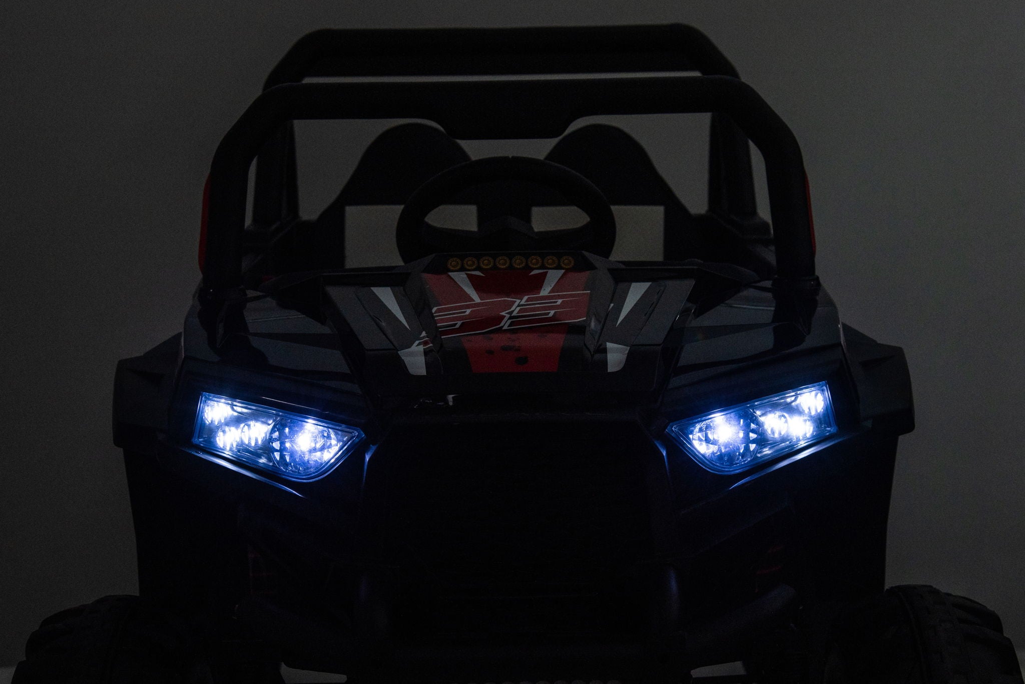 12V7A*2 30W*4 Four-Wheel Drive Seat One Button Start, Forward And Backward, High And Low Speed, Music, Front Light, Power Display, Two Doors Can Open, 2.4G R / C, Seat Belt Four Wheel Absorber