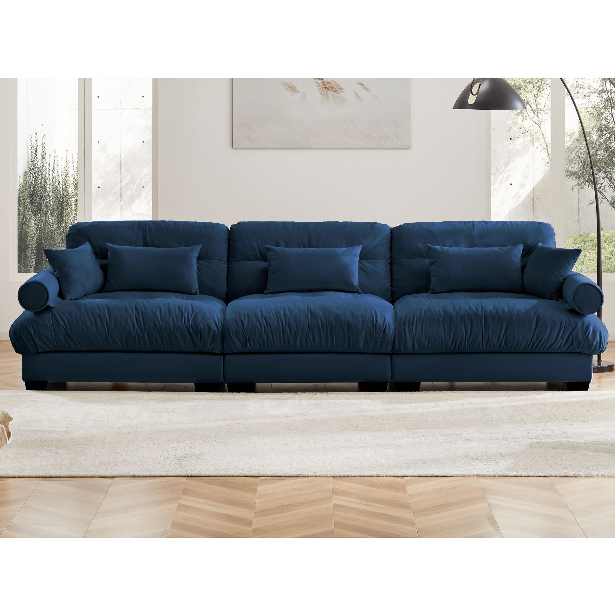 Modern Sofa With Bolstered Armrests And Pillows