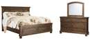 Flynnter Brown Panel Bedroom Set